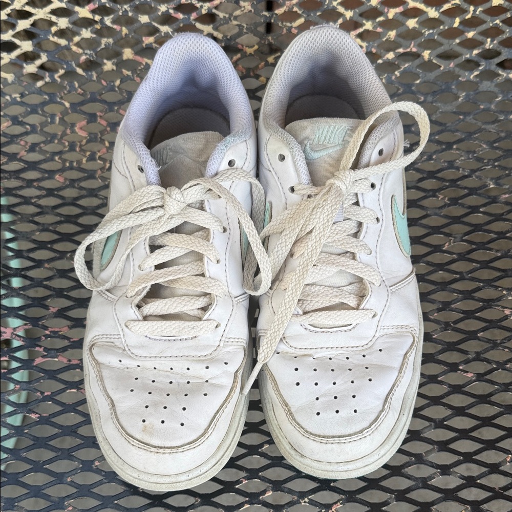 Nike White Sneakers with Mint Swoosh Accent